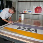Tyler at Work on Visa Card